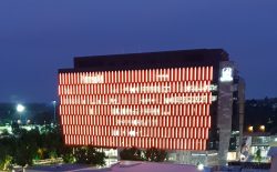 Ipswich City Council building lit up organge as part of the 16 Days of Activism.